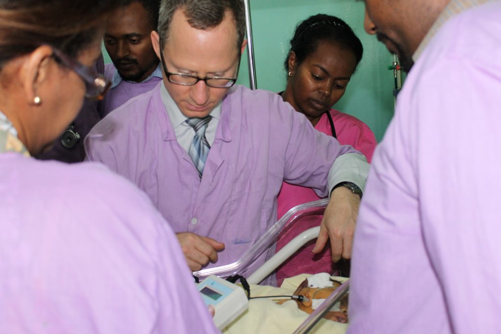 Jerald Altman, MD working with Sophia Mengistu, MD and her NICU team.