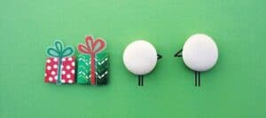 Gift boxes and egg characters promoting children's safety awareness for "Don't Stick Don't Stuff" book, educational safety messages for kids, playful and colorful safety awareness image, kid-friendly safety illustration.